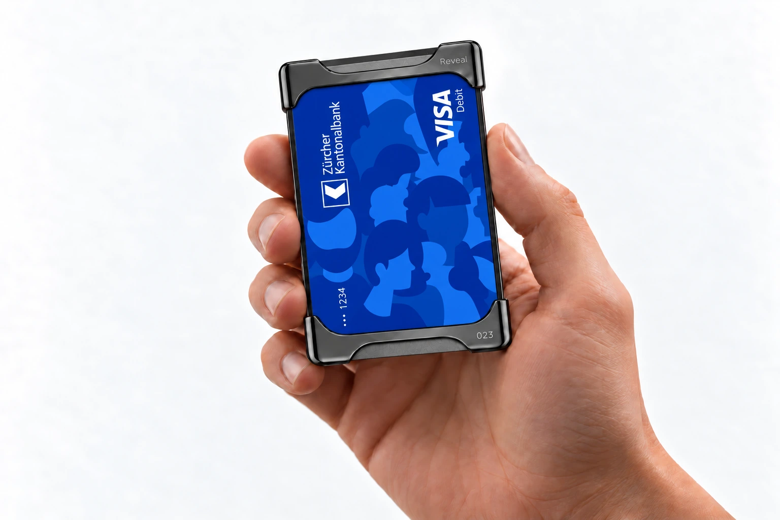 Dark Grey Reveal Wallet, numbered 023, framing a blue ZKB Visa Debit card in a hand