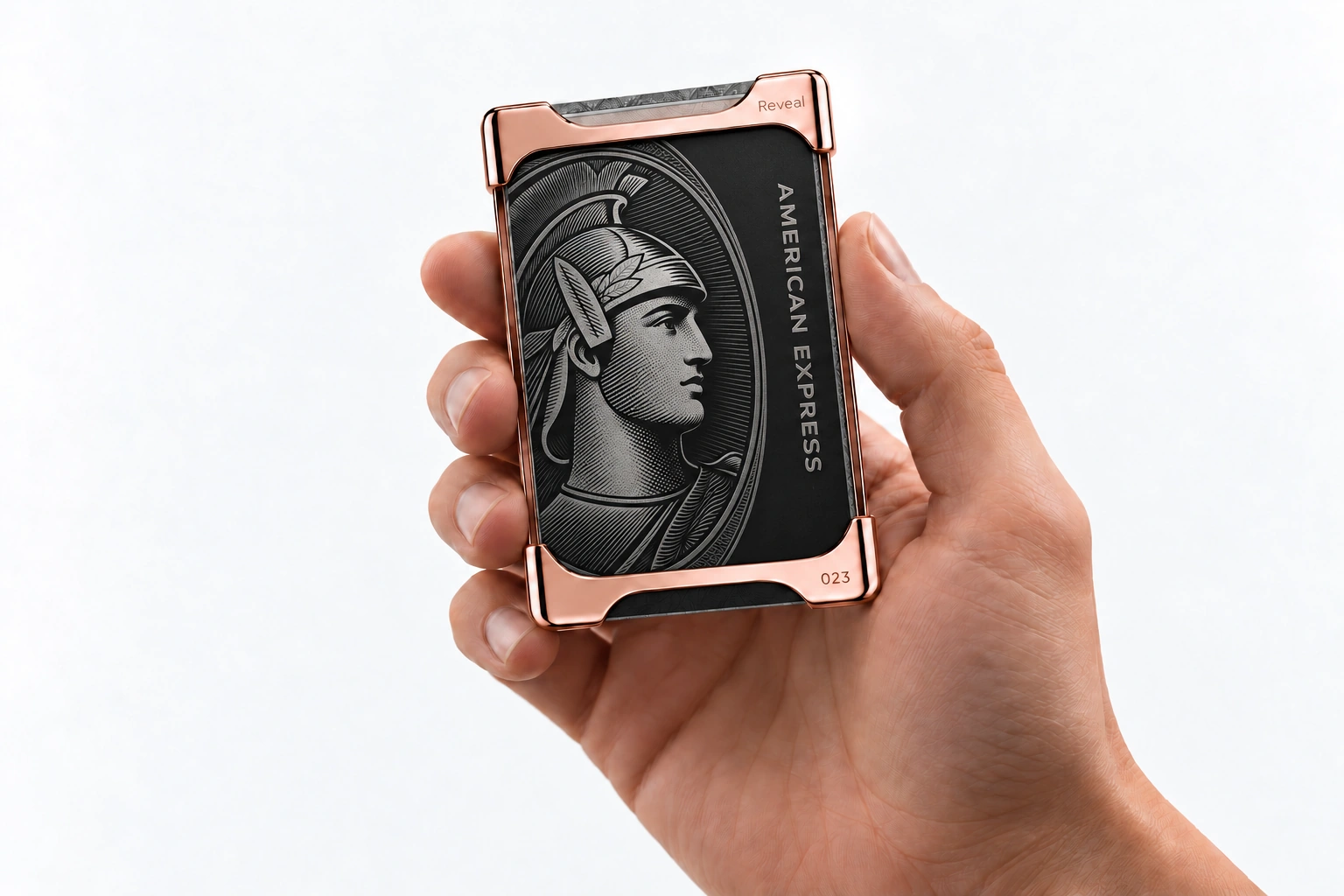 Rose Gold Reveal Wallet, numbered 023, framing a black Centurion card in a hand